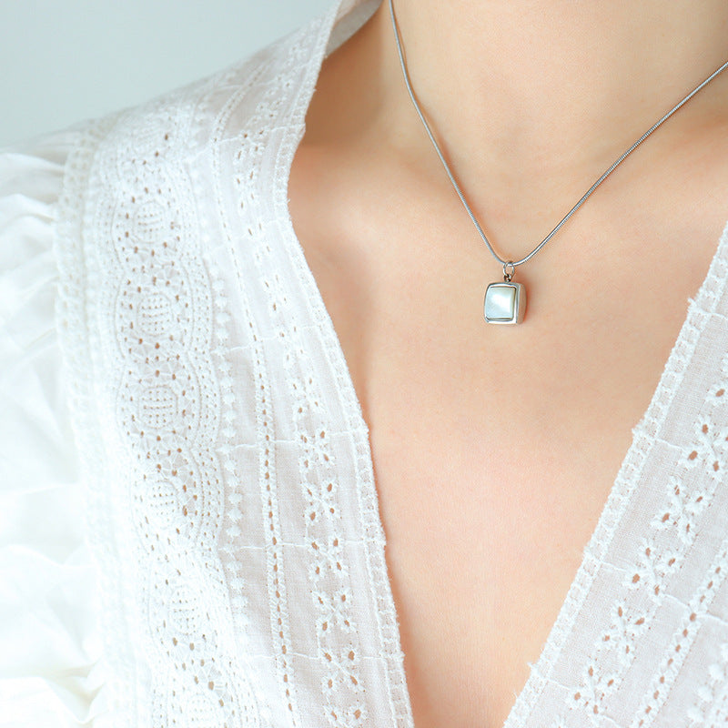 Polished White Scallop Shell Necklace