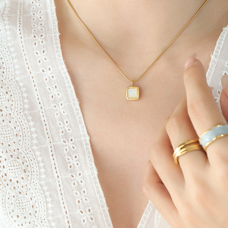 Polished White Scallop Shell Necklace