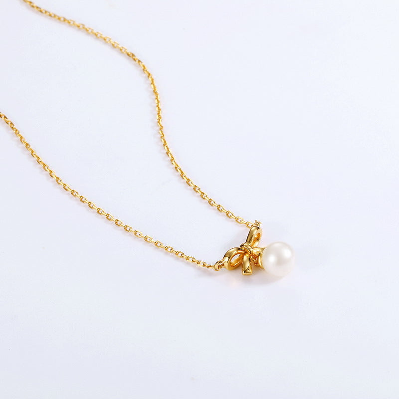 Bow Tie Necklace With Pearl Pendant