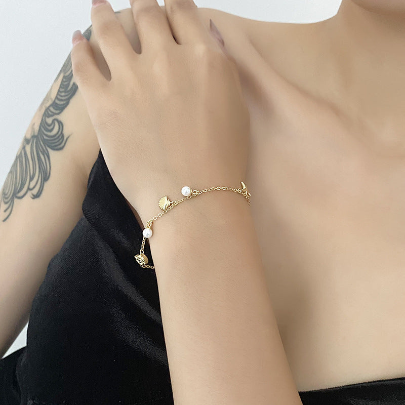 Gold Bracelet With Pearl Charm