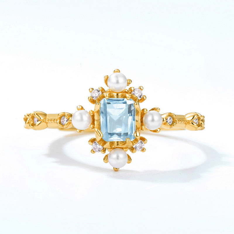 Sky Blue Topaz And Pearl Ring