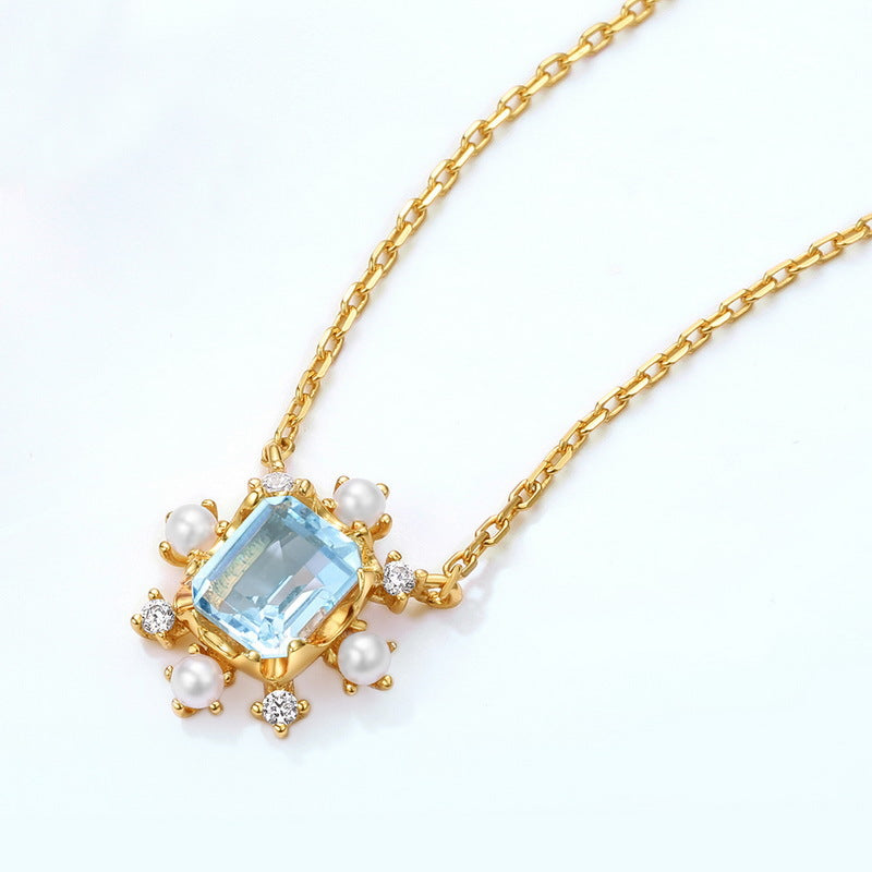 Pearl Blue Topaz Snowflake Necklace