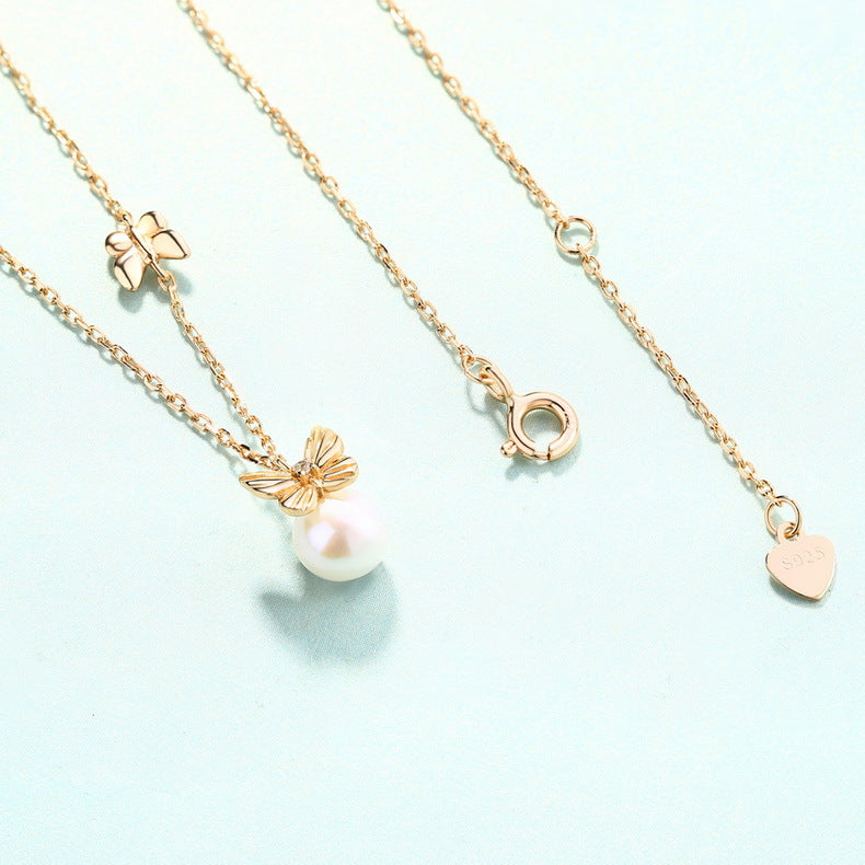 Pearl And Butterfly Pendant Necklace