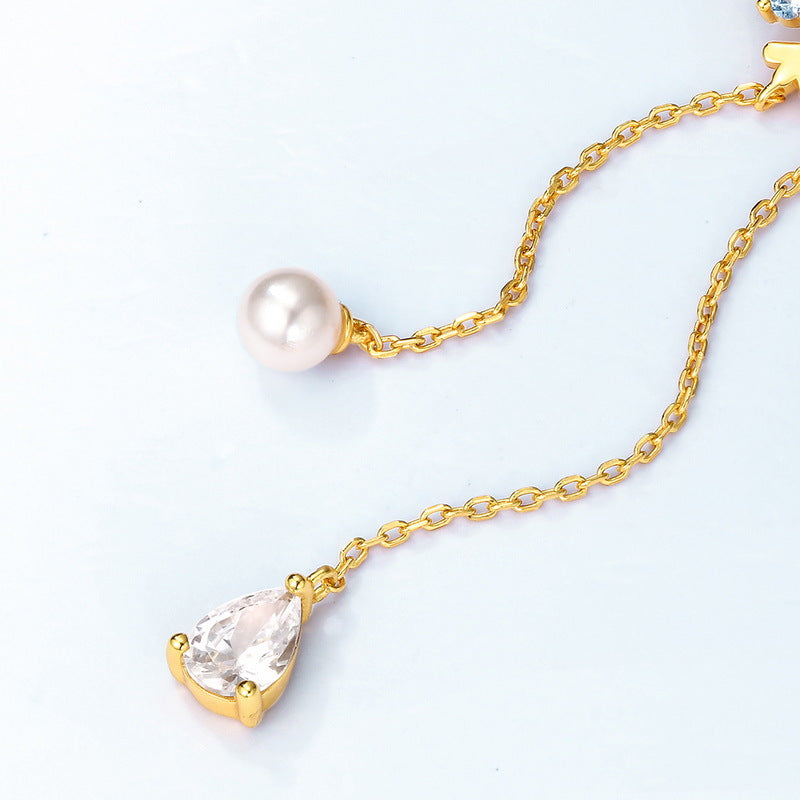 Pearl And Snowflake Pendant Necklace